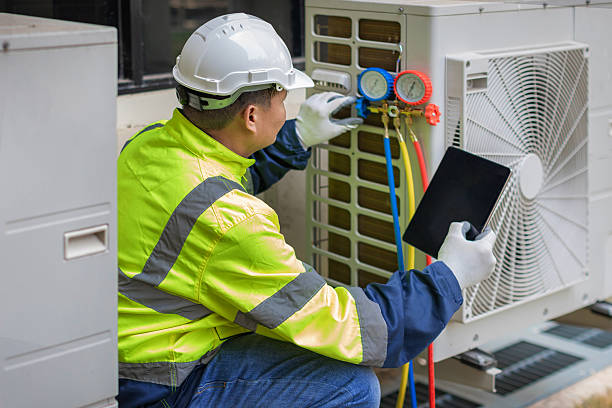 Professional Air Duct Cleaning technician working in Danville, VA